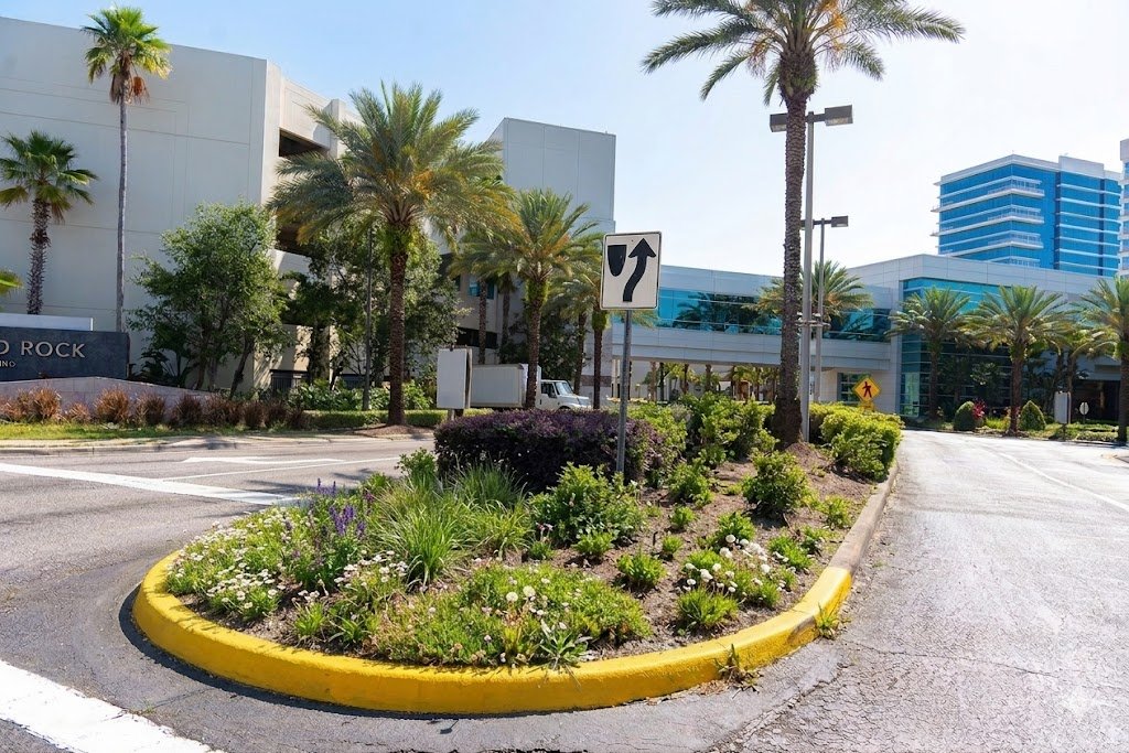 Community median before enhancement, with overgrown and uneven plantings